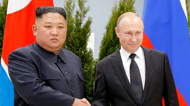 Russian President Vladimir Putin, right, and North Korea's leader Kim Jong Un