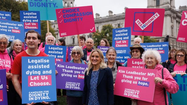 Kim Leadbeater, centre, has brought forward the historic proposals